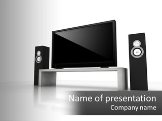 A Computer Monitor And Speakers On A Table PowerPoint Template