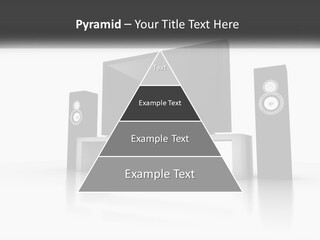 A Computer Monitor And Speakers On A Table PowerPoint Template