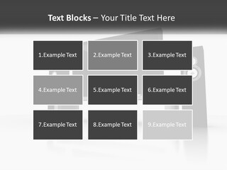 A Computer Monitor And Speakers On A Table PowerPoint Template