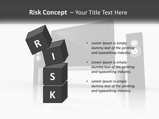 A Computer Monitor And Speakers On A Table PowerPoint Template