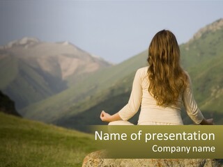 A Woman Sitting On A Rock In The Middle Of A Field PowerPoint Template