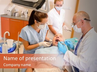 A Group Of People Standing Around A Man In A Dentist's Chair PowerPoint Template
