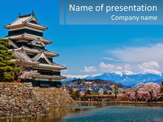 A Large Building Sitting On Top Of A Lake PowerPoint Template