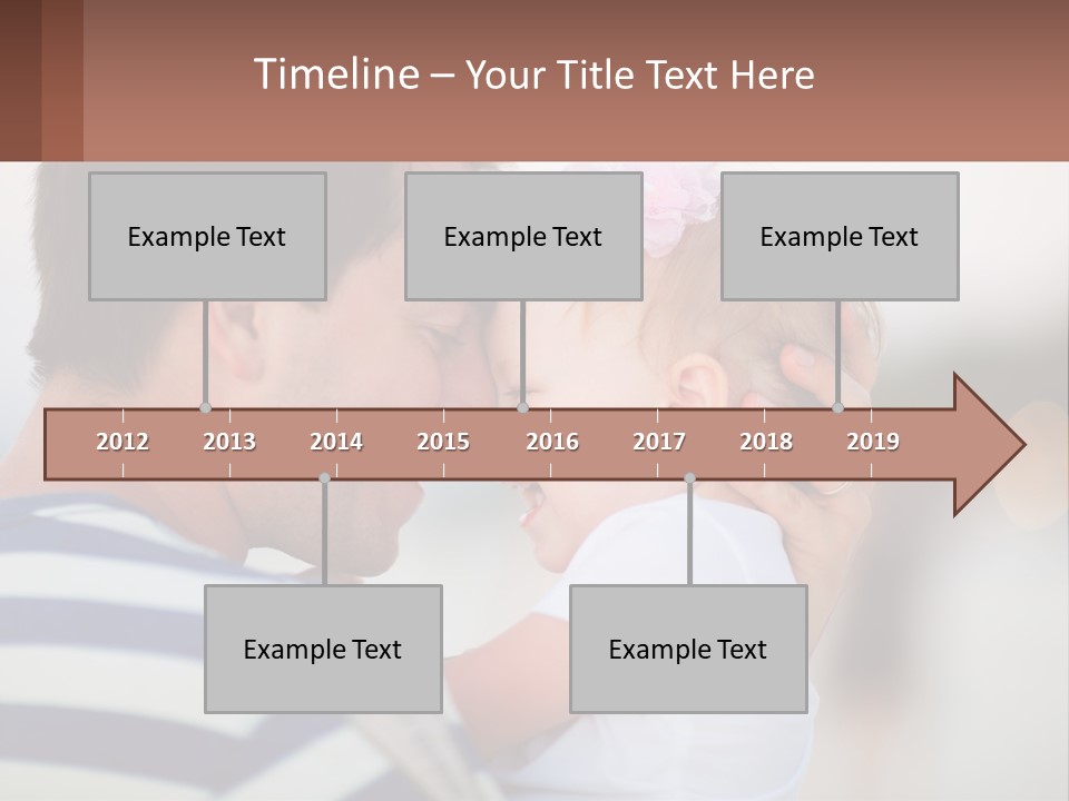 A Man Holding A Baby In His Arms PowerPoint Template
