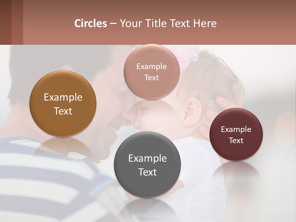 A Man Holding A Baby In His Arms PowerPoint Template