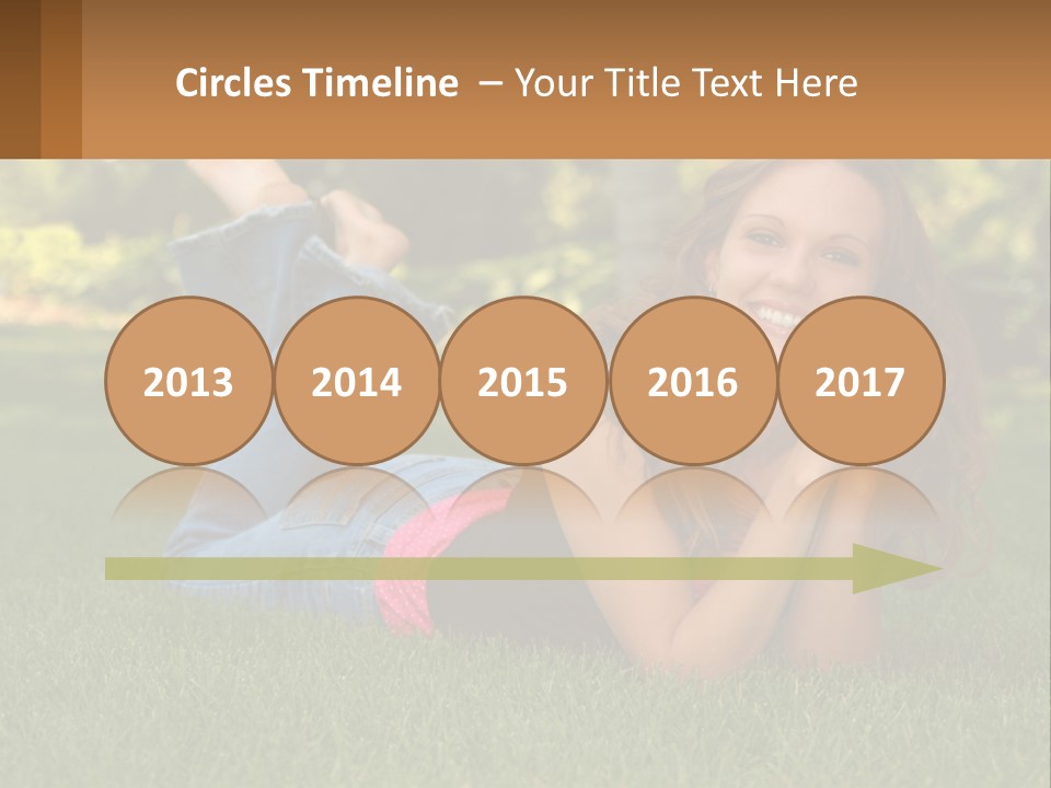 A Beautiful Woman Laying On The Grass In A Park PowerPoint Template