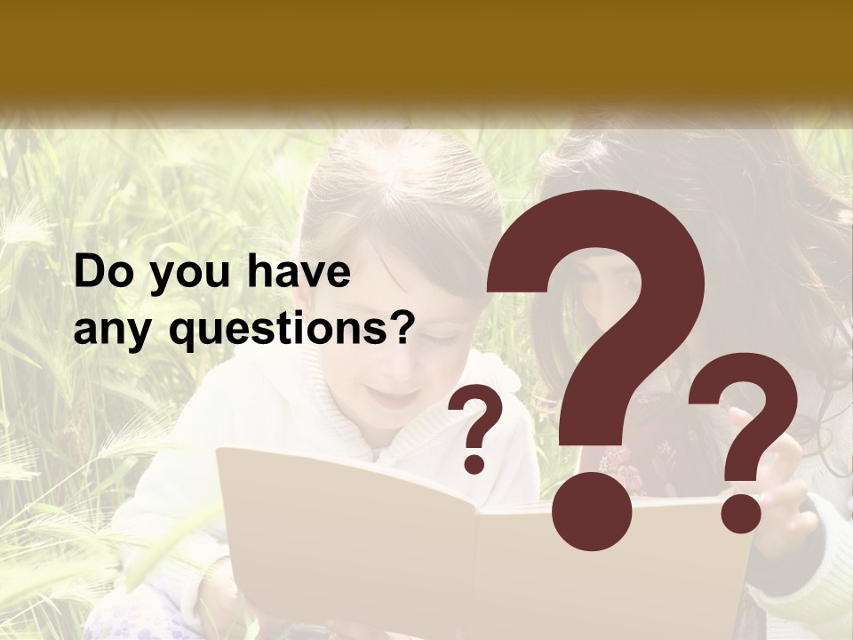 Two Little Girls Are Looking At A Book PowerPoint Template