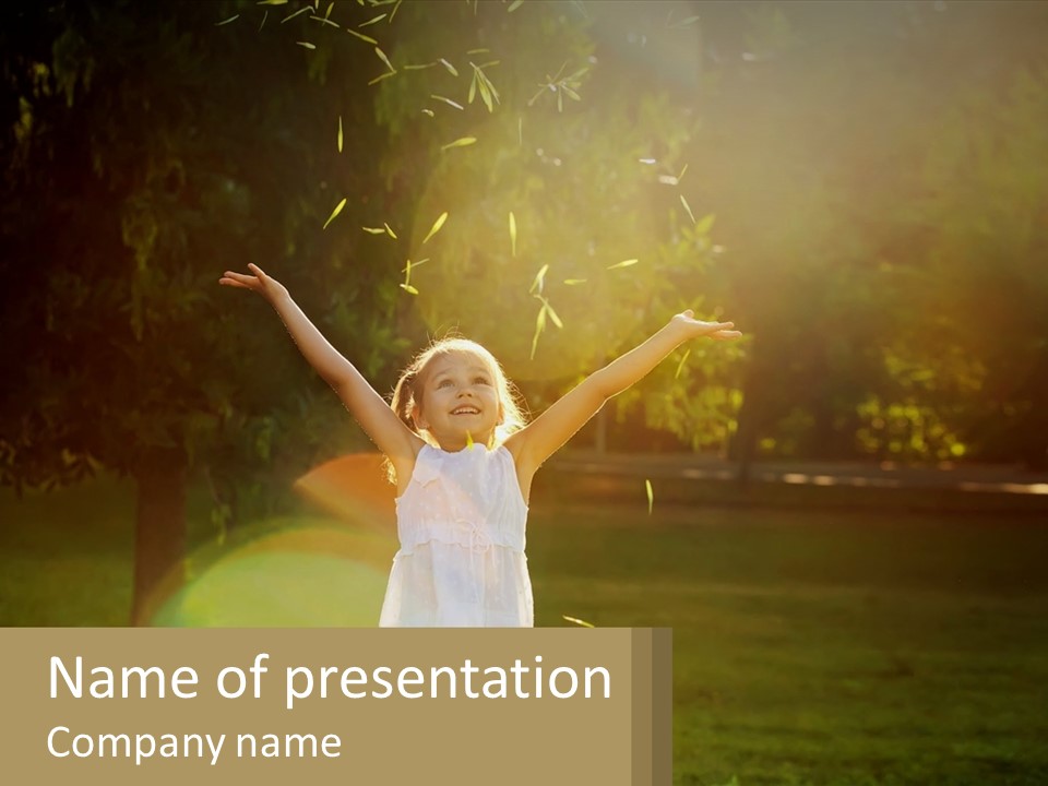 A Little Girl Is Standing In The Grass With Her Arms Outstretched PowerPoint Template