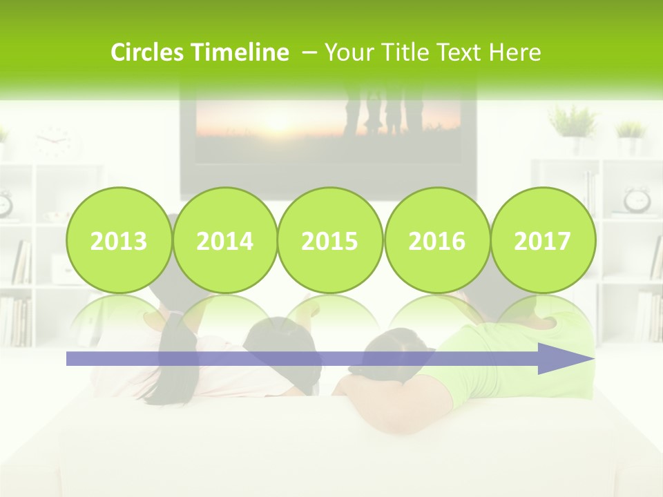 A Group Of People Sitting In Front Of A Tv PowerPoint Template