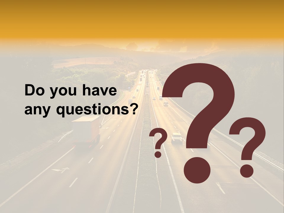 A Highway With Cars Driving Down It At Sunset PowerPoint Template