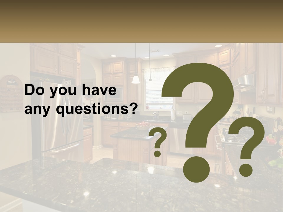 A Kitchen With Granite Counter Tops And Wooden Cabinets PowerPoint Template