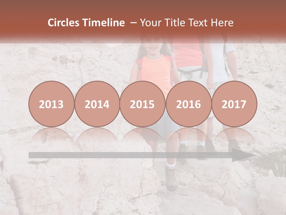 A Group Of People Standing On Top Of A Mountain PowerPoint Template