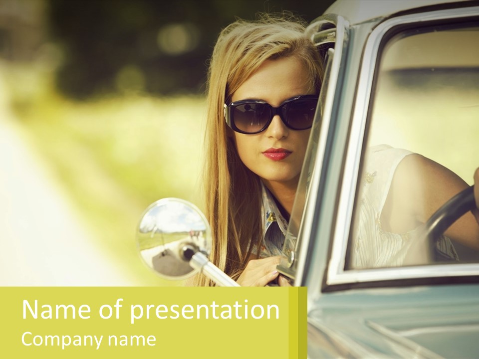 A Woman In Sunglasses Leaning Out The Window Of A Car PowerPoint Template