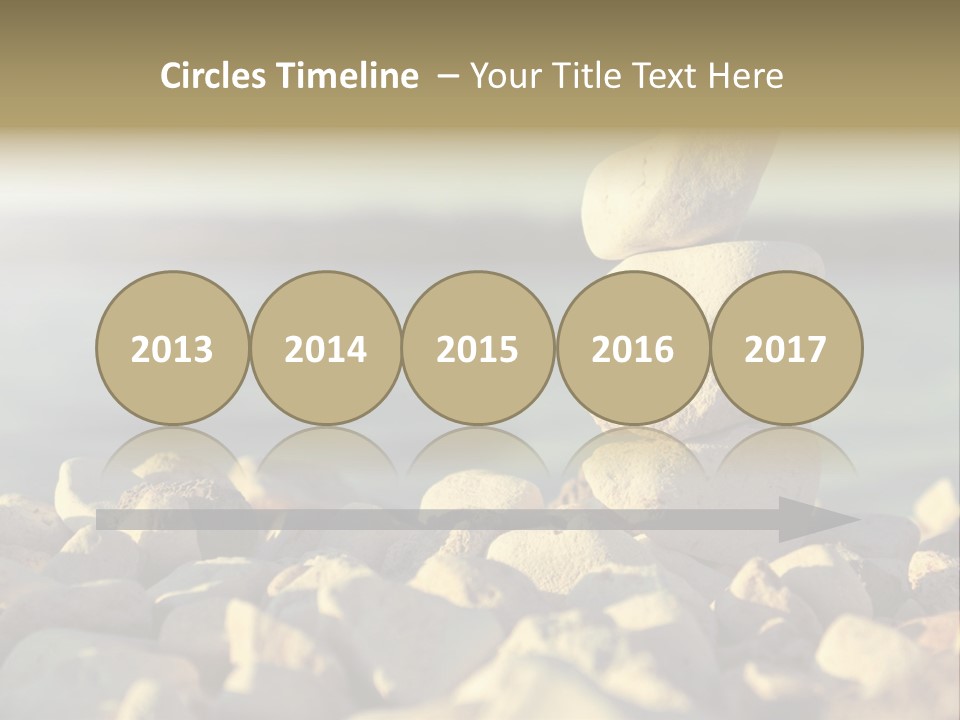 A Pile Of Rocks Sitting On Top Of A Beach PowerPoint Template