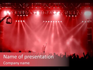 A Red Stage With Spotlights And A Crowd Of People PowerPoint Template