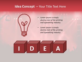 A Red Stage With Spotlights And A Crowd Of People PowerPoint Template
