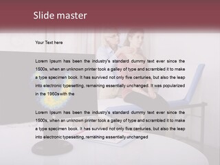 A Man And Woman Sitting In Front Of A Computer Screen PowerPoint Template