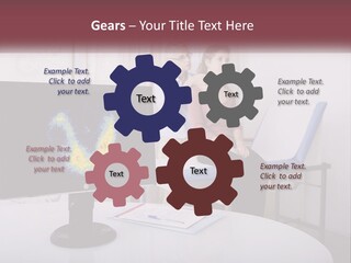 A Man And Woman Sitting In Front Of A Computer Screen PowerPoint Template