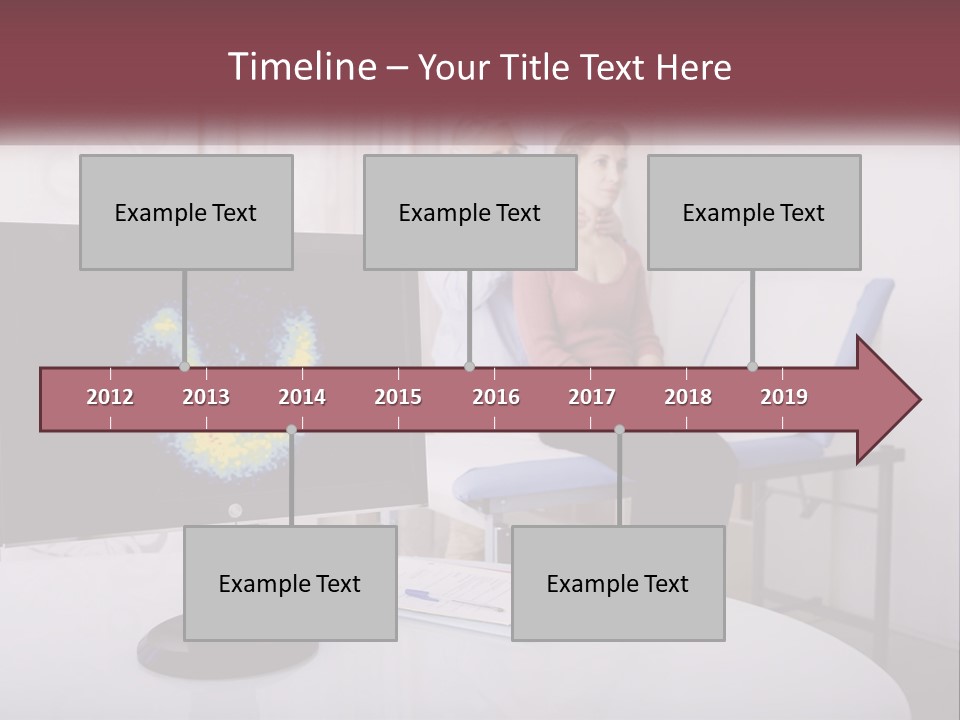 A Man And Woman Sitting In Front Of A Computer Screen PowerPoint Template