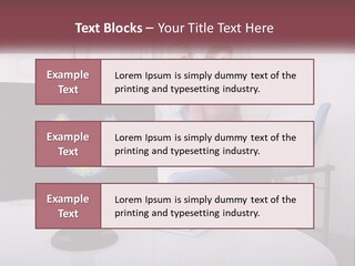 A Man And Woman Sitting In Front Of A Computer Screen PowerPoint Template