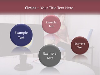 A Man And Woman Sitting In Front Of A Computer Screen PowerPoint Template