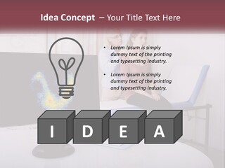 A Man And Woman Sitting In Front Of A Computer Screen PowerPoint Template