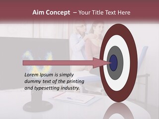 A Man And Woman Sitting In Front Of A Computer Screen PowerPoint Template