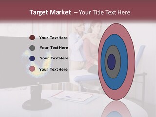 A Man And Woman Sitting In Front Of A Computer Screen PowerPoint Template