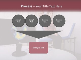 A Man And Woman Sitting In Front Of A Computer Screen PowerPoint Template