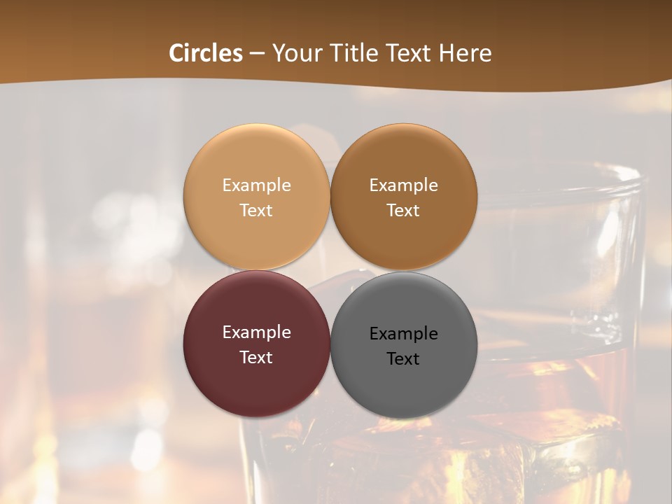 A Glass Of Whiskey With Ice On A Table PowerPoint Template