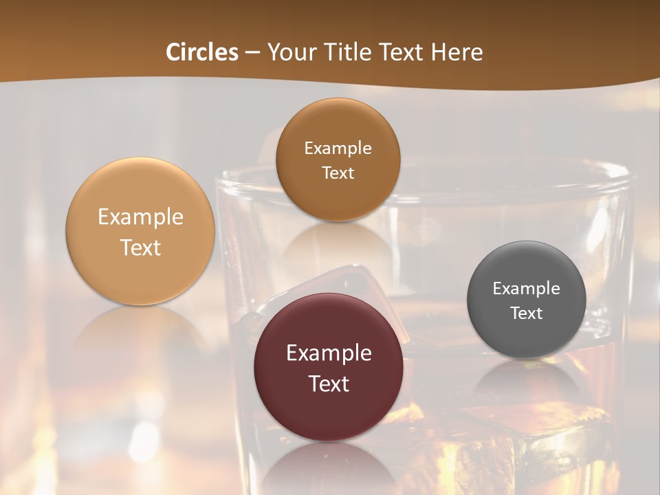 A Glass Of Whiskey With Ice On A Table PowerPoint Template