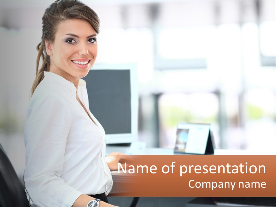 A Woman Sitting At A Desk With A Laptop PowerPoint Template