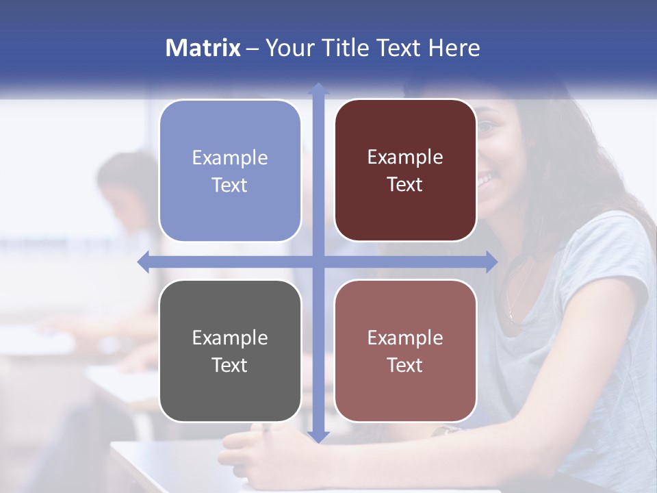 A Woman Sitting At A Desk In A Classroom PowerPoint Template