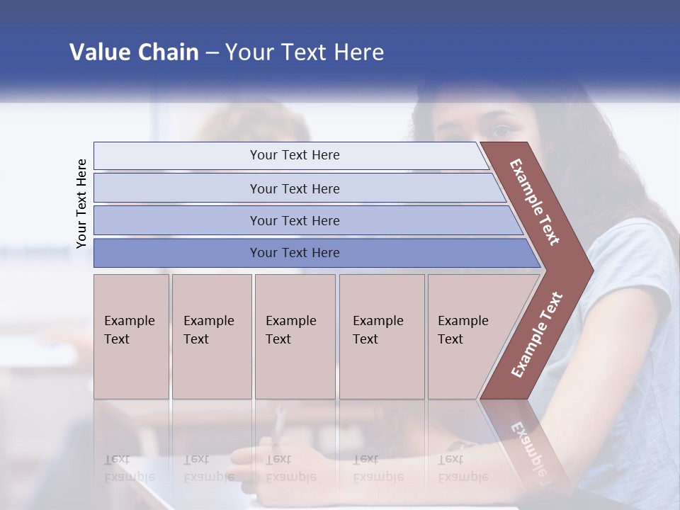 A Woman Sitting At A Desk In A Classroom PowerPoint Template