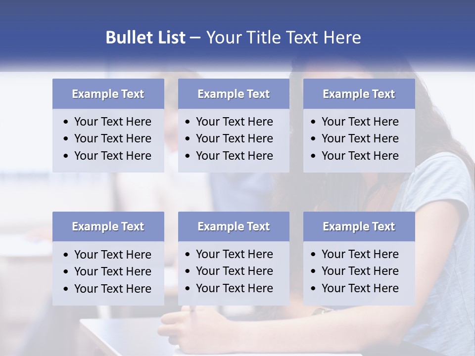 A Woman Sitting At A Desk In A Classroom PowerPoint Template