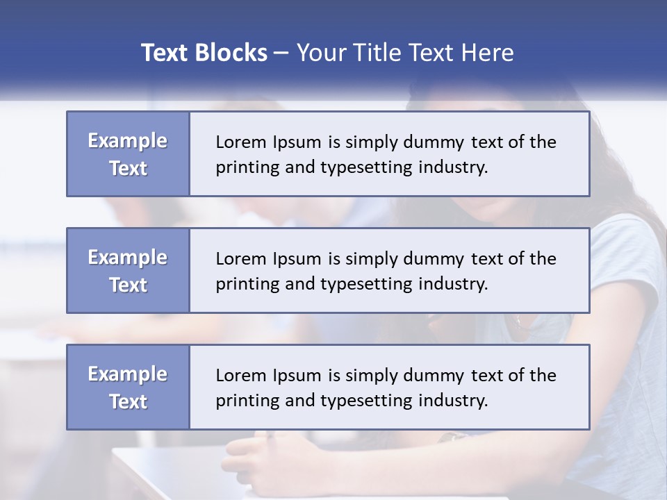 A Woman Sitting At A Desk In A Classroom PowerPoint Template