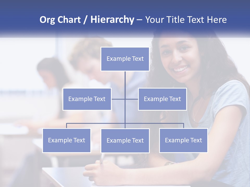 A Woman Sitting At A Desk In A Classroom PowerPoint Template