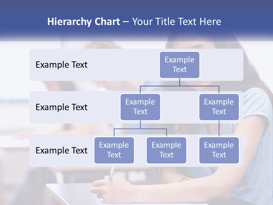 A Woman Sitting At A Desk In A Classroom PowerPoint Template