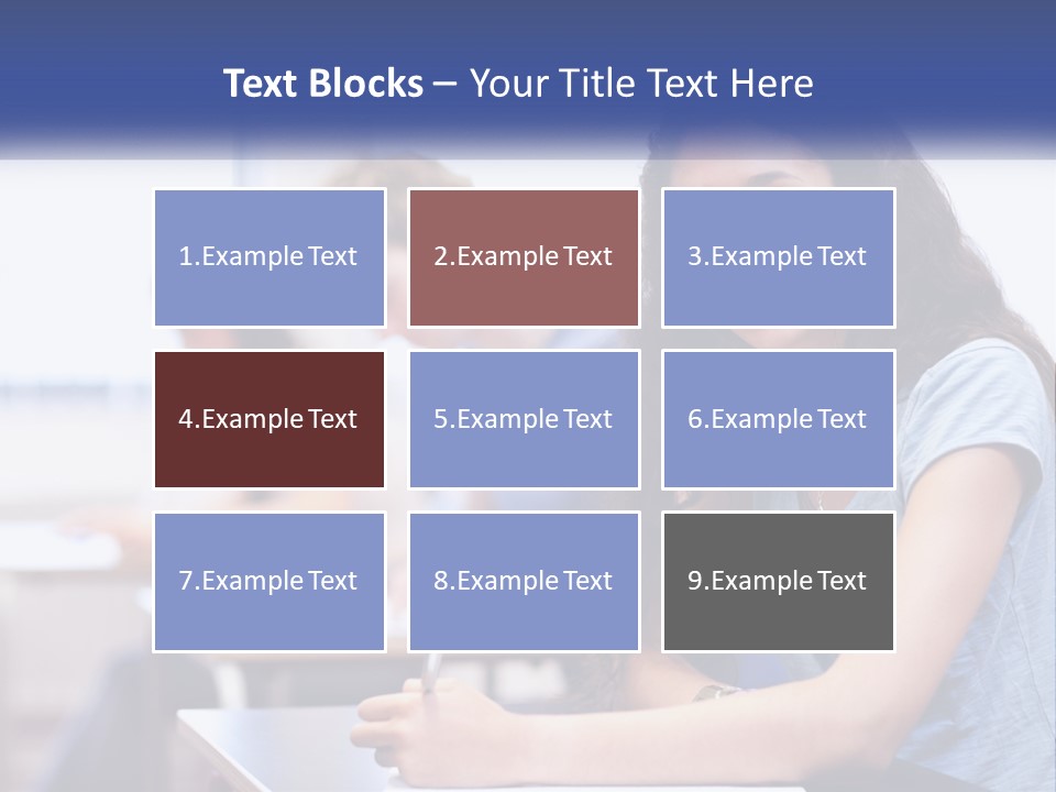 A Woman Sitting At A Desk In A Classroom PowerPoint Template