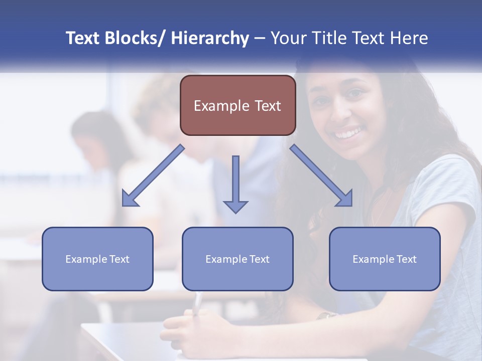 A Woman Sitting At A Desk In A Classroom PowerPoint Template