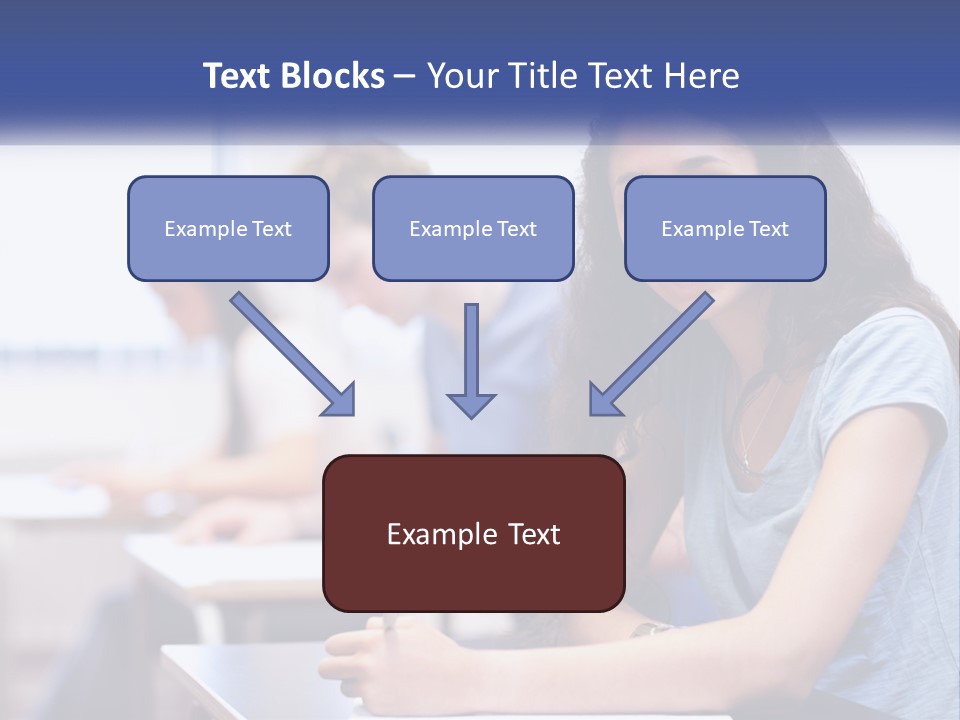 A Woman Sitting At A Desk In A Classroom PowerPoint Template
