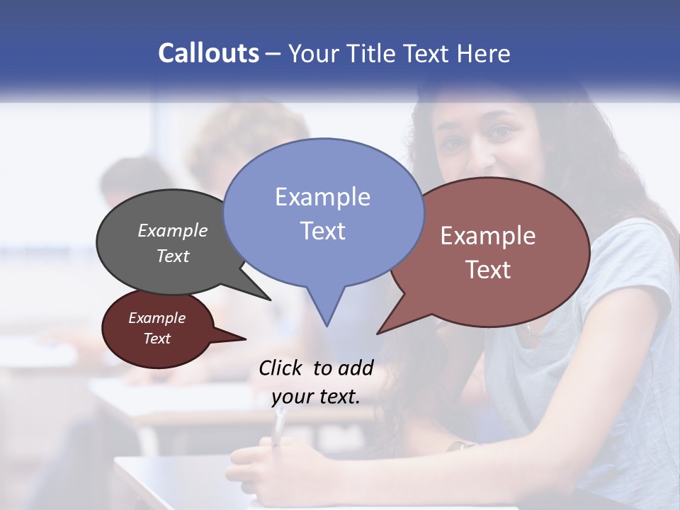 A Woman Sitting At A Desk In A Classroom PowerPoint Template