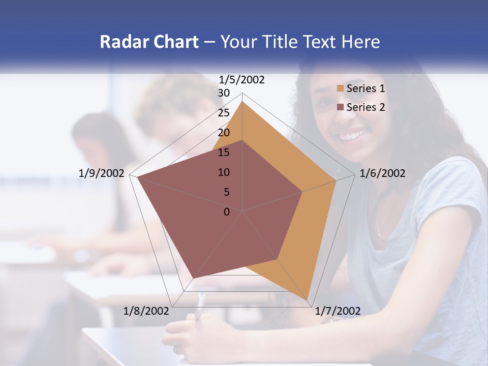A Woman Sitting At A Desk In A Classroom PowerPoint Template