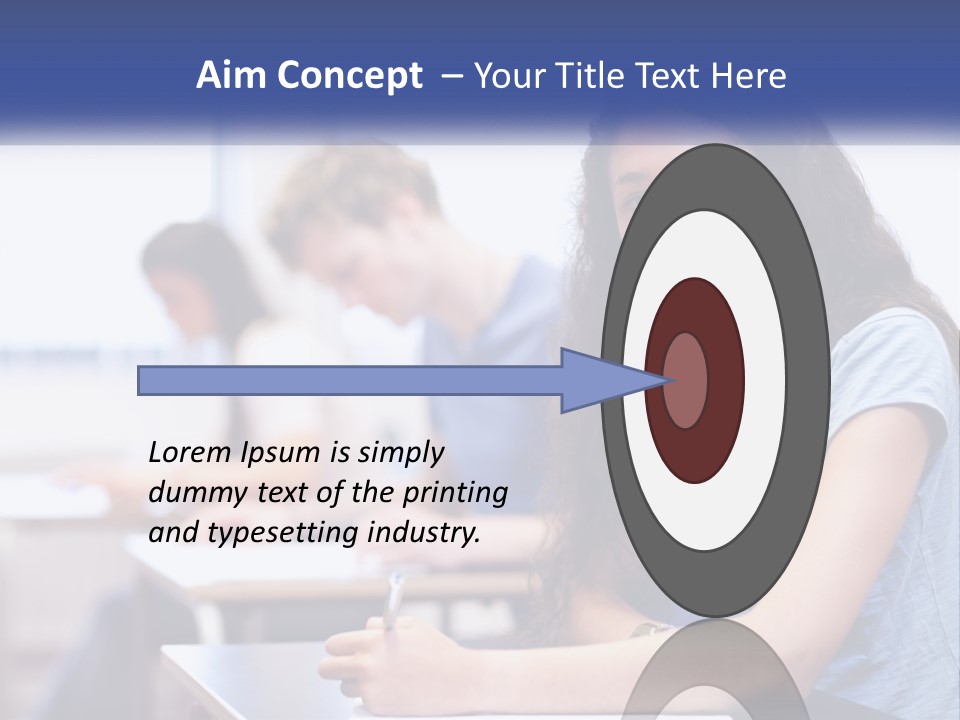 A Woman Sitting At A Desk In A Classroom PowerPoint Template
