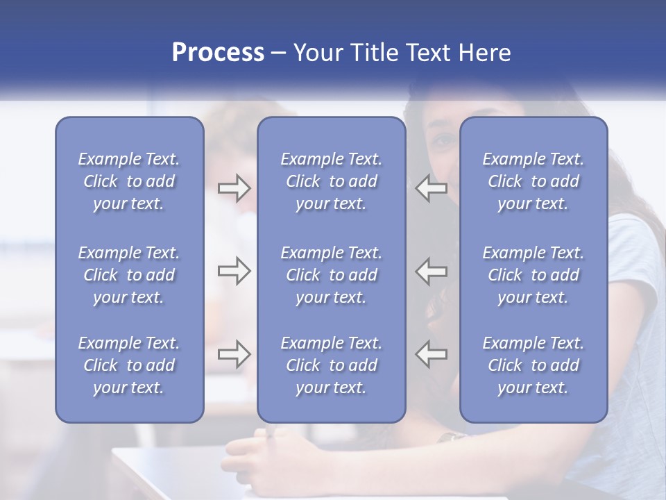 A Woman Sitting At A Desk In A Classroom PowerPoint Template