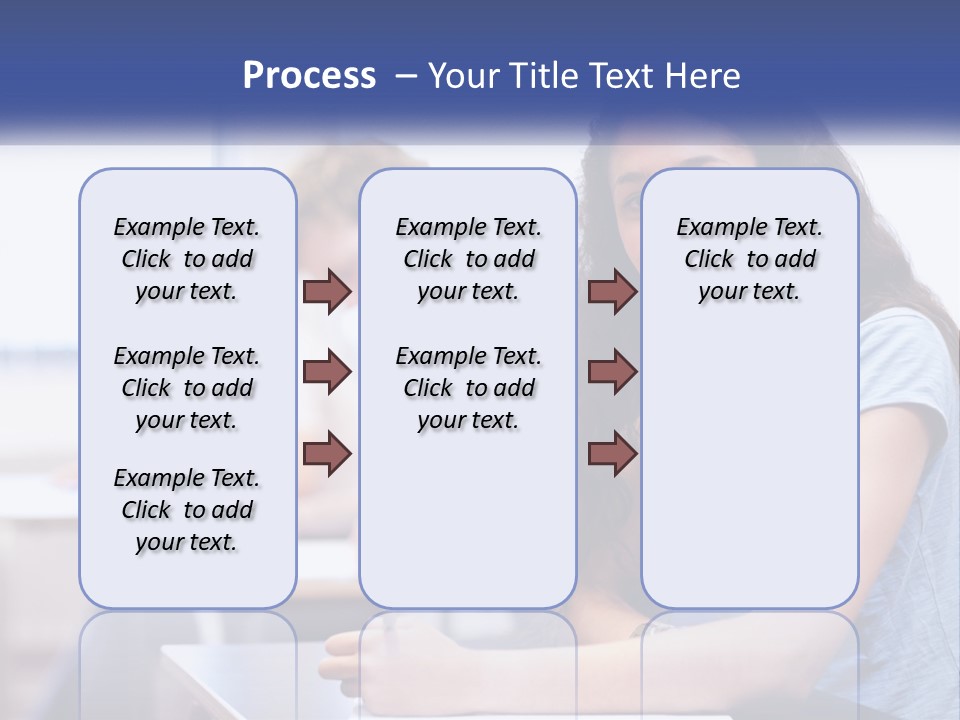 A Woman Sitting At A Desk In A Classroom PowerPoint Template