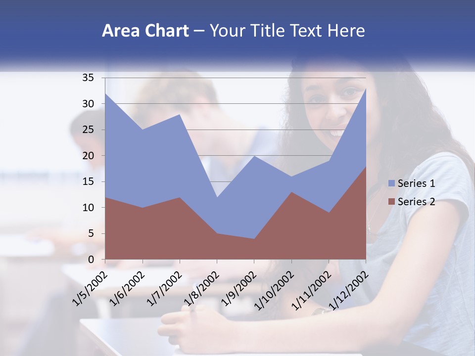 A Woman Sitting At A Desk In A Classroom PowerPoint Template