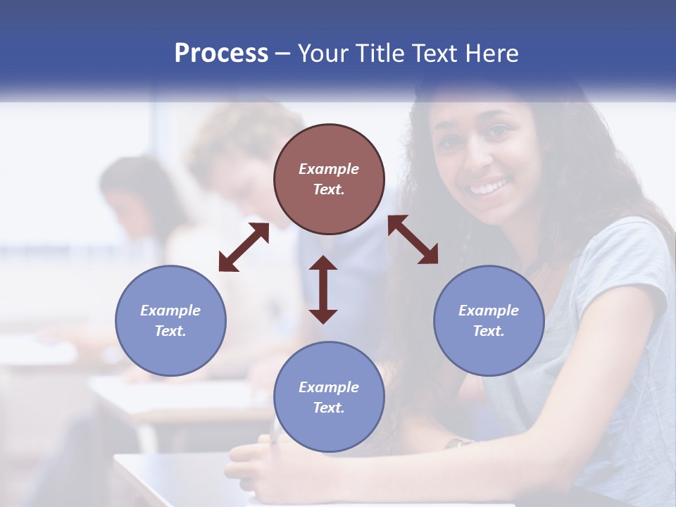 A Woman Sitting At A Desk In A Classroom PowerPoint Template