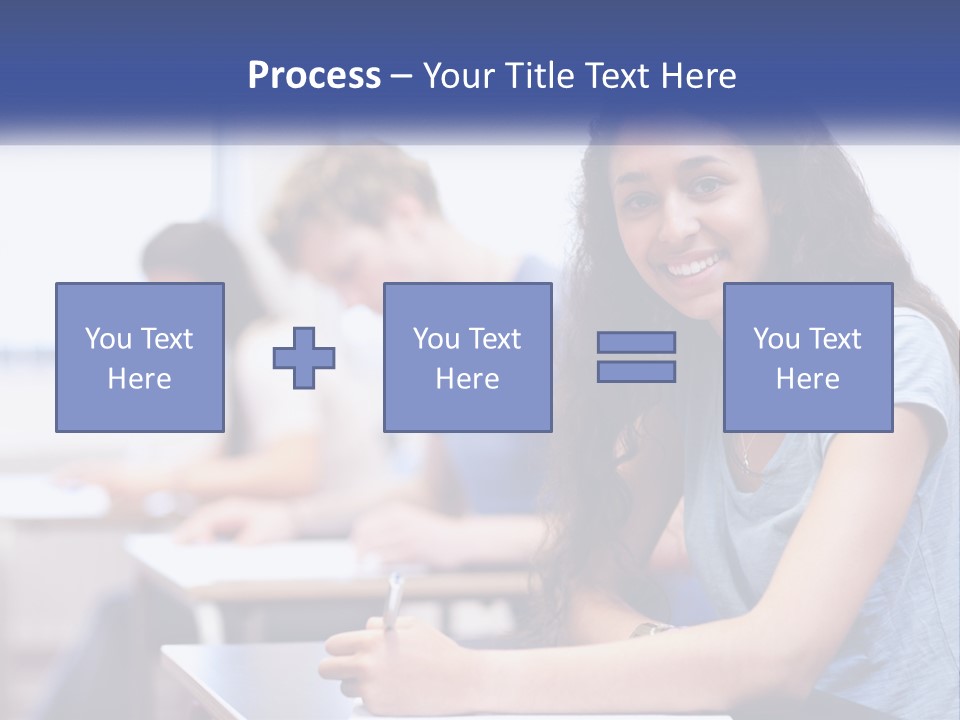 A Woman Sitting At A Desk In A Classroom PowerPoint Template