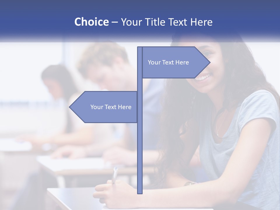 A Woman Sitting At A Desk In A Classroom PowerPoint Template